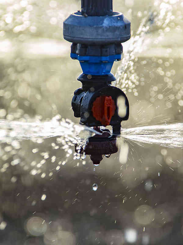 Close up of Nelson Irrigation's A3030 Accelerator with Maroon Plate, Uni-Flo regulator and 1 1b. zinc weight