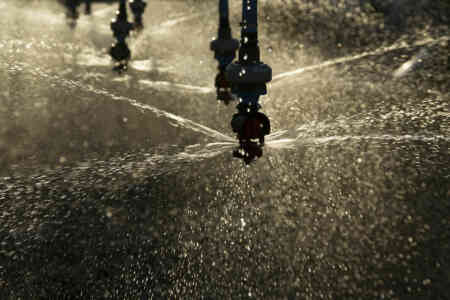 Silhouettes of Nelson Irrigation's A3030 Accelerators in Texas