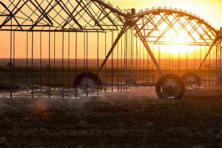 Nelson Irrigation's A3030 Accelerators at sunset in Texas