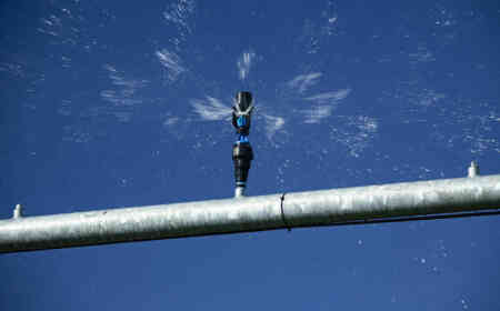 Nelson Irrigation's Orbitor FX, Up-Top Pivot Sprinkler creates random droplets