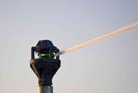 Nelson Irrigation's R33 Rotator® sprinkler with blue sky